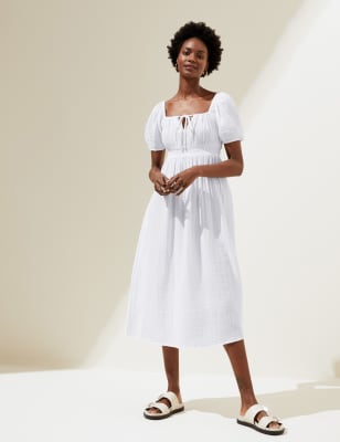 white tea dress with sleeves