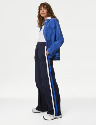 Sporty trousers with side cheap stripe