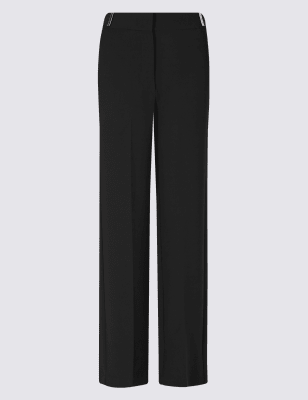 Широкие брюки римской посадки