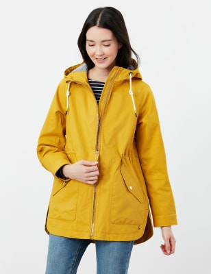 women's yellow raincoat and boots